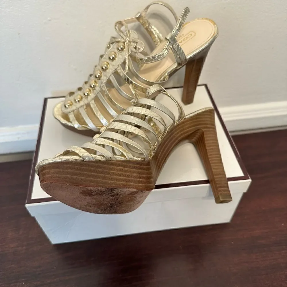 Coach  Women’s platform heel  leather sandal  in gold size 7